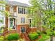 Charming townhome with brick facade, landscaped front yard, and inviting entryway at 815 Granby Dr, Fort Mill, SC 29708