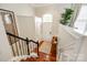 Bright foyer with hardwood floors, staircase, and a charming arched window above the door at 815 Granby Dr, Fort Mill, SC 29708