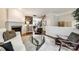 Spacious living room showcasing a fireplace, hardwood floors, and contemporary furnishings at 815 Granby Dr, Fort Mill, SC 29708