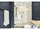 Modern glass shower featuring black fixtures and white subway tile at 815 Granby Dr, Fort Mill, SC 29708