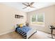 Cozy bedroom with a queen bed, large window, and neutral-colored walls at 8460 Fairgreen Ave, Waxhaw, NC 28173