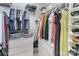 Walk-in closet with ample storage space and organized shelving for clothes, bags, and shoes at 915 Northeast Dr # 15, Davidson, NC 28036