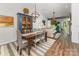 Cozy dining area with stylish furniture, ample natural light, and an open flow to the living room at 915 Northeast Dr # 15, Davidson, NC 28036