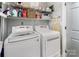 Well-equipped laundry room with modern LG washer and dryer, plus plenty of shelving at 915 Northeast Dr # 15, Davidson, NC 28036