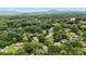 Scenic aerial shot displaying homes amidst lush tree cover and distant mountain views at 935 Church St, Kings Mountain, NC 28086