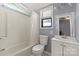 Bathroom with shower and tub, a large window, and a white vanity at 935 Church St, Kings Mountain, NC 28086