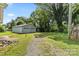 Exterior shot of a two-car detached garage with a gravel driveway at 935 Church St, Kings Mountain, NC 28086