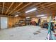 Bright garage interior with wooden framing, ample workspace, and storage shelves at 935 Church St, Kings Mountain, NC 28086