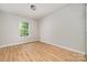 Well-lit bedroom with new luxury vinyl flooring and modern neutral colors at 9630 Turning Wheel Dr, Charlotte, NC 28214
