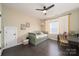 Bedroom with a daybed, natural light from window and small wooden desk at 11324 Fullerton Place Nw Dr, Huntersville, NC 28078