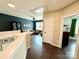 Upstairs living area featuring a comfortable sofa and large windows, providing ample light at 11324 Fullerton Place Nw Dr, Huntersville, NC 28078