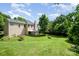 Expansive backyard featuring a well-maintained lawn, perfect for outdoor activities and gatherings at 11802 Fox Glen Rd, Charlotte, NC 28269