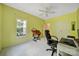 Study with a large window, desk, printer, and carpeting at 1201 Beckford Glen Dr, Waxhaw, NC 28173