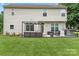 Home with a spacious backyard and patio area at 13528 Philip Michael Rd, Huntersville, NC 28078