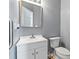 Bathroom featuring a sleek vanity and a commode at 13528 Philip Michael Rd, Huntersville, NC 28078