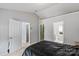 This bedroom is complete with high ceilings, closet and bathroom access, soft carpeting, perfect for relaxation at 13528 Philip Michael Rd, Huntersville, NC 28078