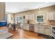 Eat-in kitchen featuring granite countertops and stainless appliances at 13528 Philip Michael Rd, Huntersville, NC 28078