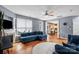 Cozy living room with a fireplace and lots of natural light at 13528 Philip Michael Rd, Huntersville, NC 28078