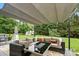 Outdoor patio space with a comfortable seating area at 13528 Philip Michael Rd, Huntersville, NC 28078