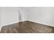 Bedroom with hardwood floors and an ensuite bathroom entrance at 15208 Caspian Way, Charlotte, NC 28278