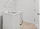 Convenient laundry room featuring new washer and dryer units at 15208 Caspian Way, Charlotte, NC 28278