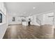 Spacious living area with hardwood floors, natural light, and an open floor plan at 15208 Caspian Way, Charlotte, NC 28278