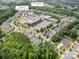 Aerial view of the home's neighborhood with Ballantyne Elementary School nearby at 15524 Scholastic Dr, Charlotte, NC 28277
