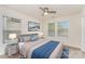 A virtually staged bedroom with plush bedding, side tables, and natural light at 15524 Scholastic Dr, Charlotte, NC 28277
