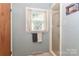 A charming bathroom featuring a window, walk-in shower, and a clean, well-maintained space at 158 Jane Sowers Rd, Statesville, NC 28625