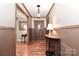 Elegant foyer showcasing hardwood floors and decorative wainscoting at 158 Jane Sowers Rd, Statesville, NC 28625