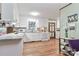 Bright kitchen features white cabinets, granite countertops and stainless appliances at 158 Jane Sowers Rd, Statesville, NC 28625