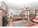 Open floor plan with a fireplace and a clear view of the connected kitchen and dining spaces at 158 Jane Sowers Rd, Statesville, NC 28625