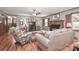 Inviting living room with a brick fireplace and stylish furniture for a comfortable ambiance at 158 Jane Sowers Rd, Statesville, NC 28625