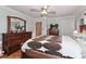 Spacious main bedroom with hardwood floors, a ceiling fan, and natural light at 158 Jane Sowers Rd, Statesville, NC 28625