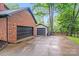 View of garage and extended driveway at 16512 Kimbolten Dr, Huntersville, NC 28078