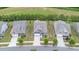 Beautiful home with a lush green lawn, landscaping, and a paved driveway leading to a two-car garage at 1663 Tranquility Blvd, Lancaster, SC 29720
