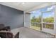 Relaxing screened-in porch with beautiful outdoor views and wicker furniture at 1663 Tranquility Blvd, Lancaster, SC 29720