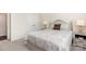 Comfortable bedroom showcasing a bed, bedside tables, and soft lighting for a relaxing ambiance at 1663 Tranquility Blvd, Lancaster, SC 29720