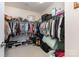 Spacious walk-in closet with ample storage and closet organizers for shoes, clothes, and accessories at 1663 Tranquility Blvd, Lancaster, SC 29720
