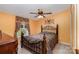 Comfortable bedroom with a ceiling fan, natural light, and carpeted floors, perfect for relaxation at 1720 Lowe Dr, Catawba, NC 28609