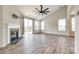 Spacious living room with a fireplace, vaulted ceiling, and sliding glass doors to the outdoor space at 173 Morgans Branch Rd, Belmont, NC 28012