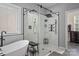 Sleek bathroom featuring a freestanding tub, glass-enclosed shower, and modern fixtures at 1849 Still Water Ln, Indian Land, SC 29707
