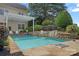 A luxurious backyard pool and patio area, perfect for relaxing and entertaining guests at 1849 Still Water Ln, Indian Land, SC 29707