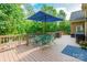 A back deck with a pool and chairs at 1868 Chestnut Hill Dr, Tega Cay, SC 29708