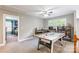 Upstairs bonus room features an air hockey table, office area, and access to another bedroom at 1868 Chestnut Hill Dr, Tega Cay, SC 29708