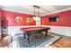 Game room with pool table, hardwood floors, and elegant decor at 1868 Chestnut Hill Dr, Tega Cay, SC 29708