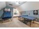 The recreational room has a carpet, a ping pong table, and a basketball hoop at 1868 Chestnut Hill Dr, Tega Cay, SC 29708