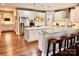 Spacious open kitchen with granite countertops, stainless steel appliances, and a large center island at 1868 Chestnut Hill Dr, Tega Cay, SC 29708