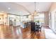 Open concept living area with breakfast bar, dining space and updated kitchen at 1868 Chestnut Hill Dr, Tega Cay, SC 29708