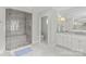 Bright bathroom features a glass shower, a toilet, and a vanity at 206 Hillside Ave, Charlotte, NC 28209